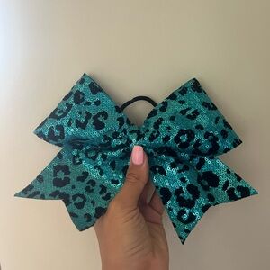Blue and black cheetah Bow